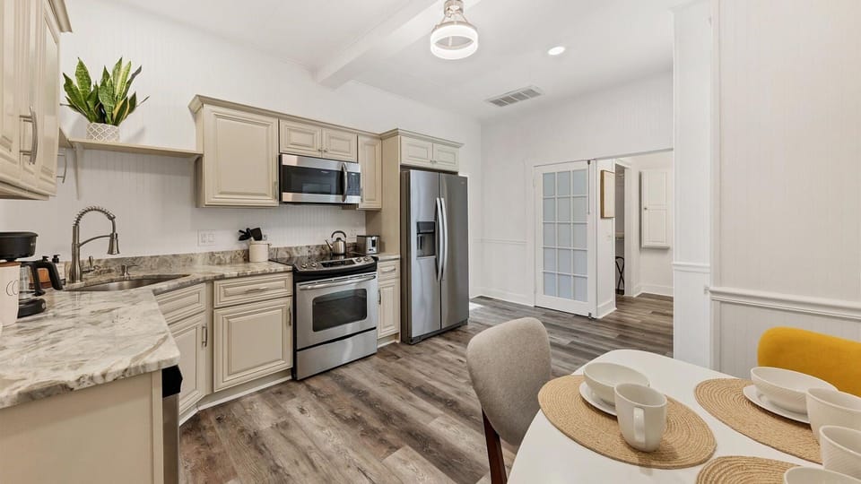 Full kitchen with stainless steel appliances