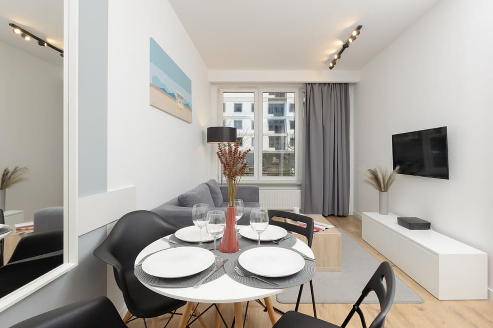 Enjoy your favorite shows on the flat-screen television in the elegant living area.