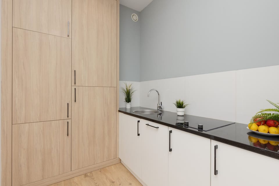 The fully equipped kitchenette includes everything you need for a home-cooked meal.