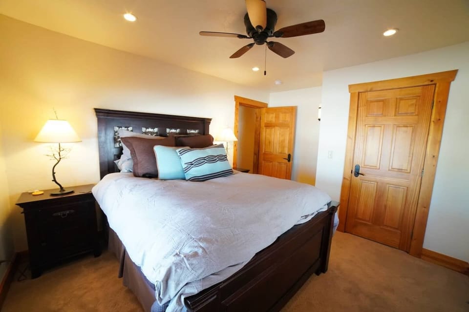 Bedroom #3, located in the basement, has a queen bed and great closet space.