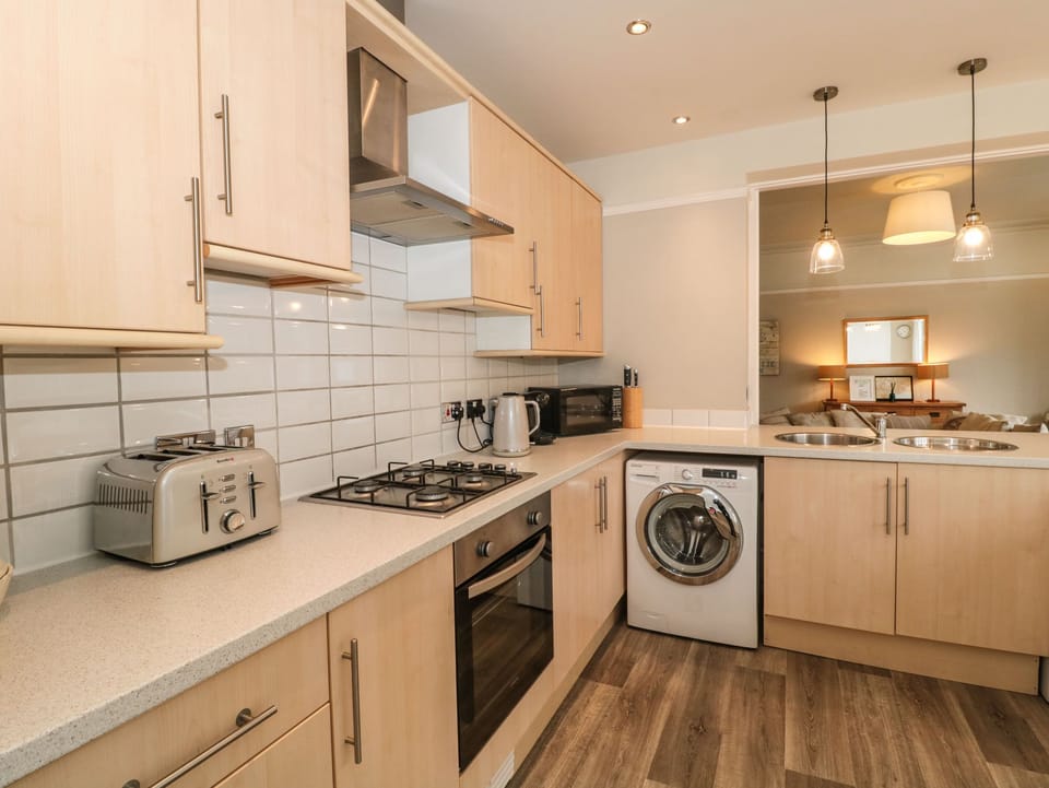 Fridge, dishwasher, electric kettle, cookware/dishes/utensils