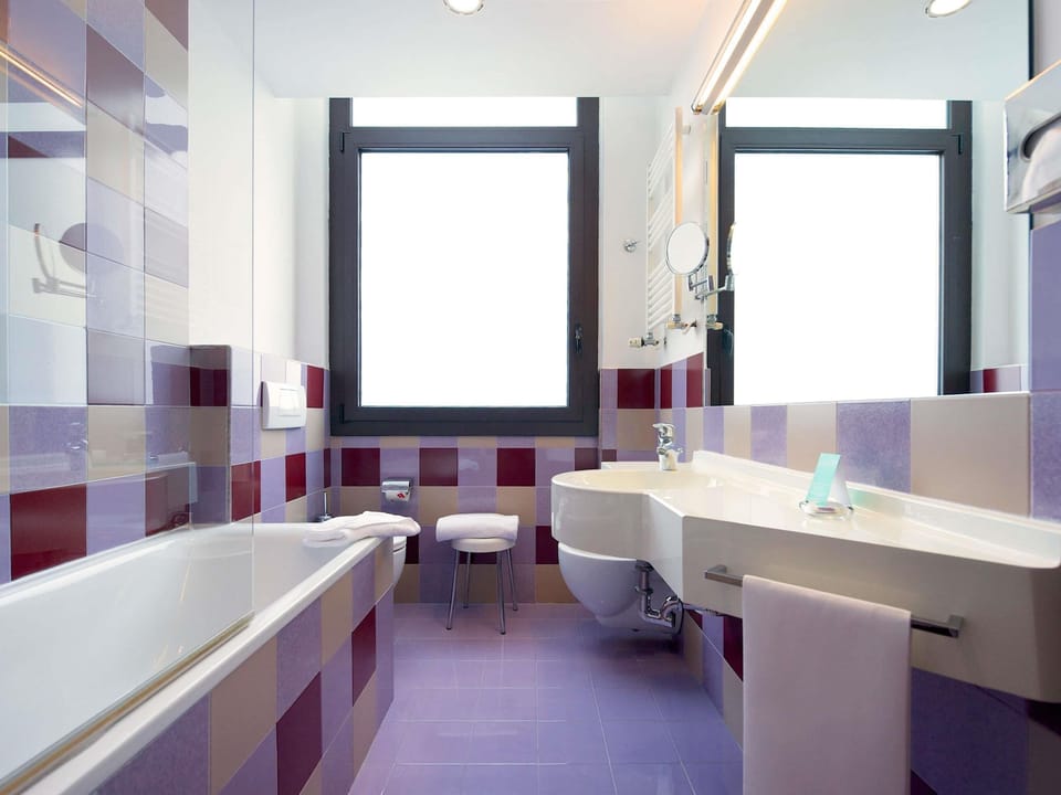 Eco-friendly toiletries, hair dryer, bidet, towels