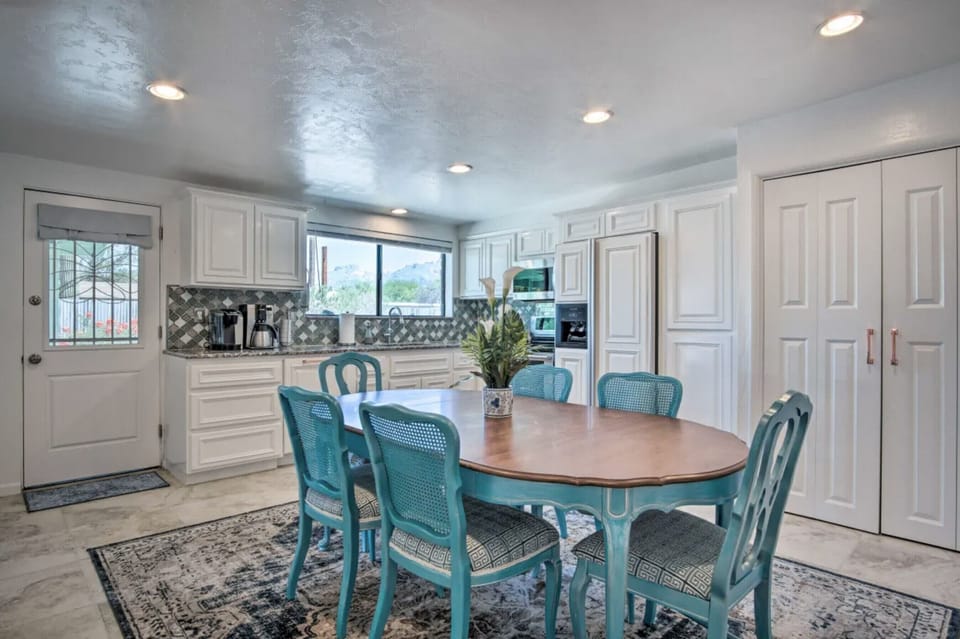 Large open concept Kitchen & Dining space! Custom vintage dining room table is great for gathering for meals.