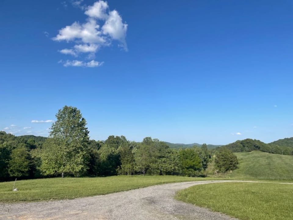 View from front porch, facing east. Lovely long views.