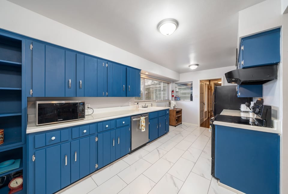 Plenty of counter space to prepare and cook meals, along with a dishwasher for easy cleanup.