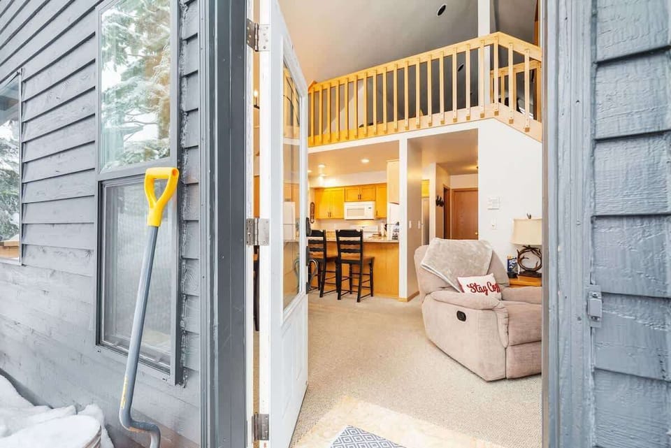 Covered entry with space to store gear. Step inside to the warmth.