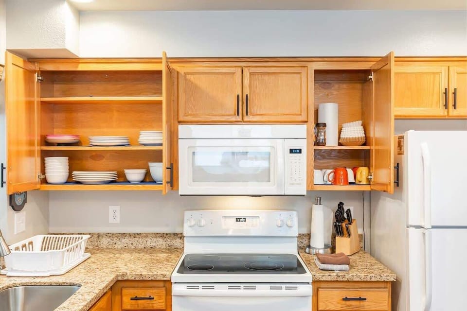 Clean, functional kitchen with major appliances and lots of prep space.