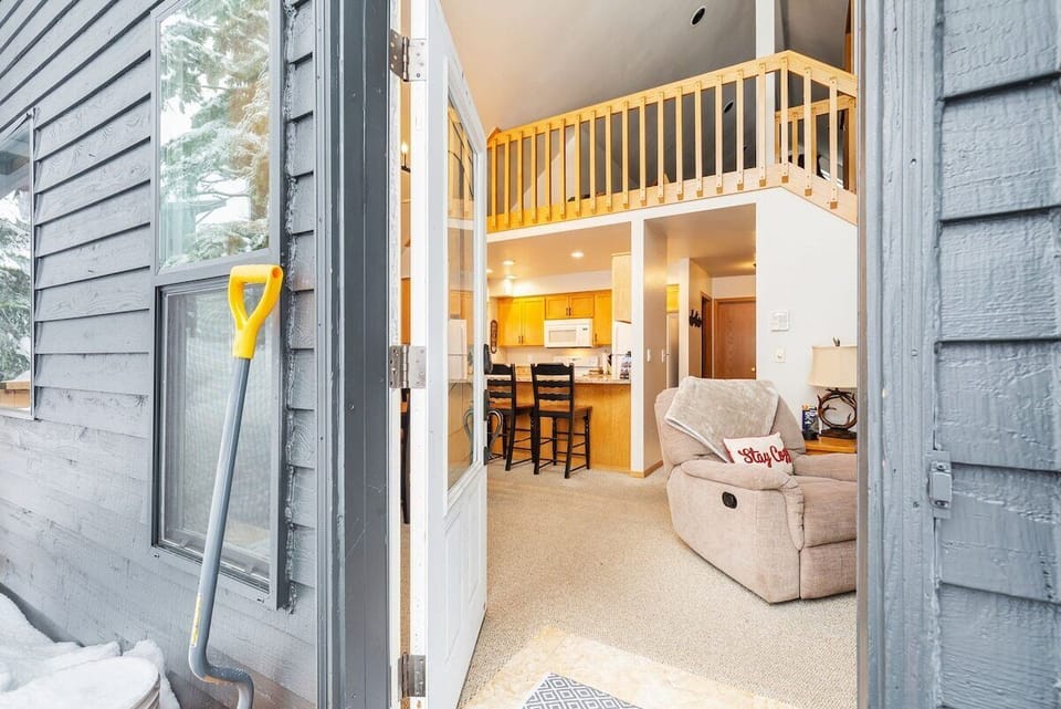 Covered entry with space to store gear. Step inside to the warmth.