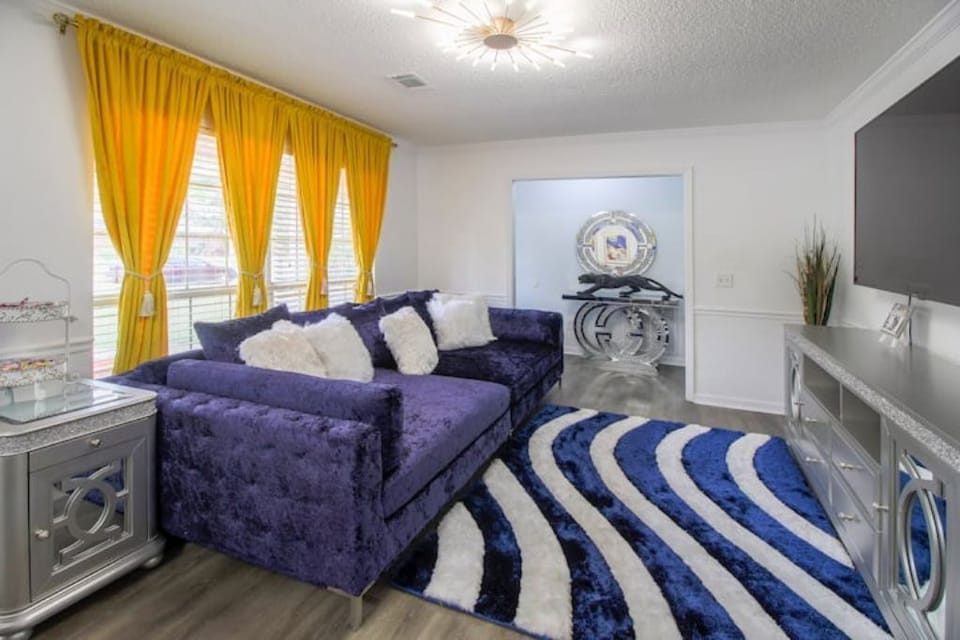Living Room with 75 " TV for additional entertainment.