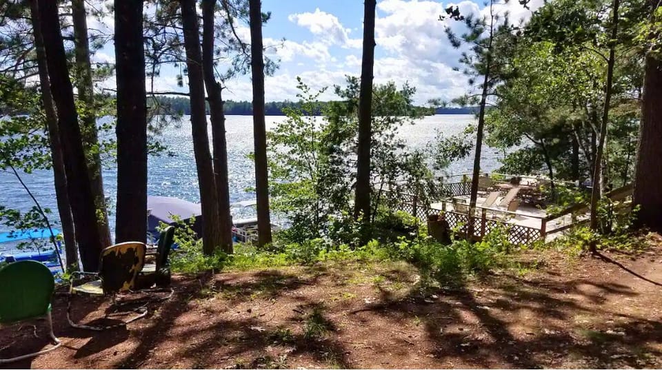 Views of Lake Tomahawk, with the boat house deck top (shared with other units)