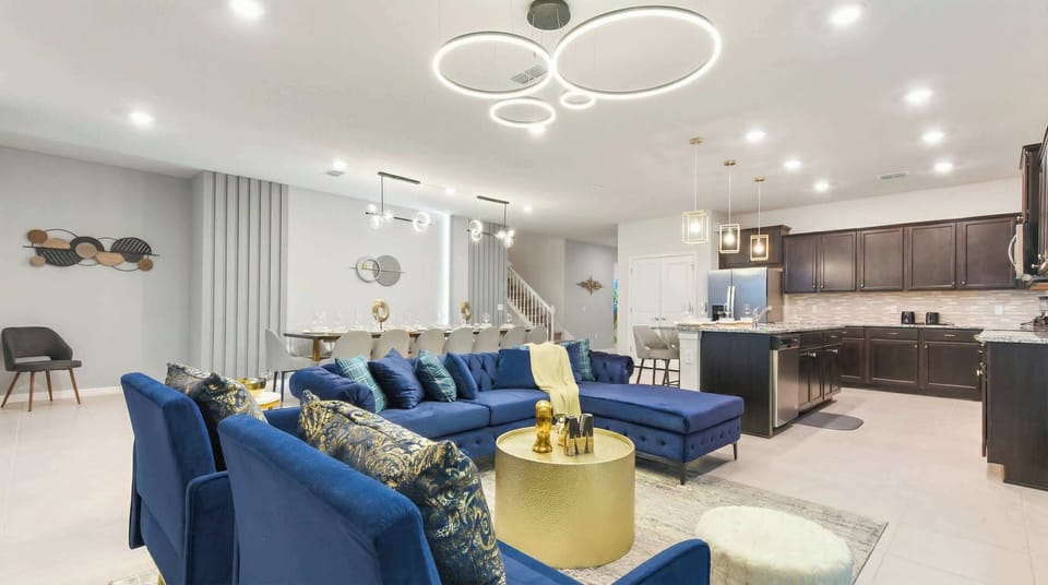 Expansive modern home, elegant dining, sleek kitchen, perfect for entertaining.