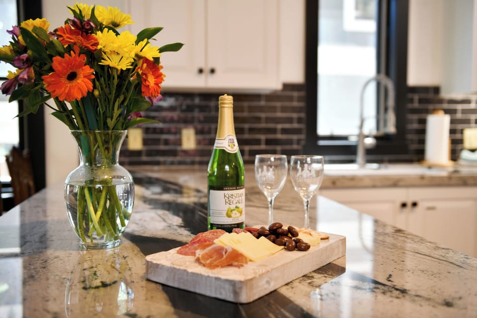 Elegant granite countertops provide ample space for meal preparation, entertaining, and enjoying quality time together.