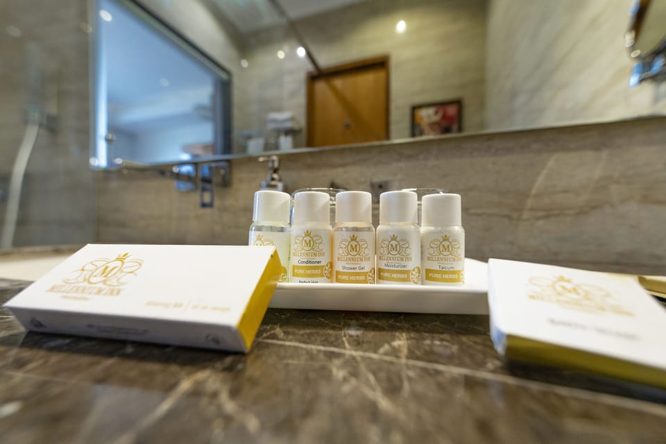 Executive Room, 1 Bedroom, Non Smoking, Refrigerator | Bathroom amenities | Free toiletries, bathrobes, slippers, bidet