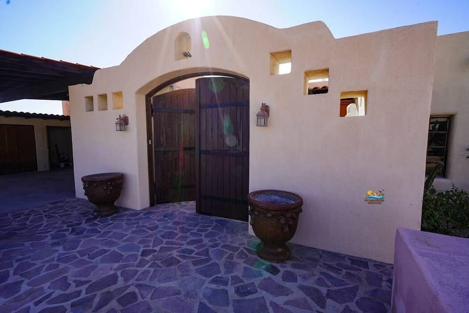 Enter through the left gate at this Chaparral vacation rental in El Dorado Ranch San Felipe BC — privacy and security included.