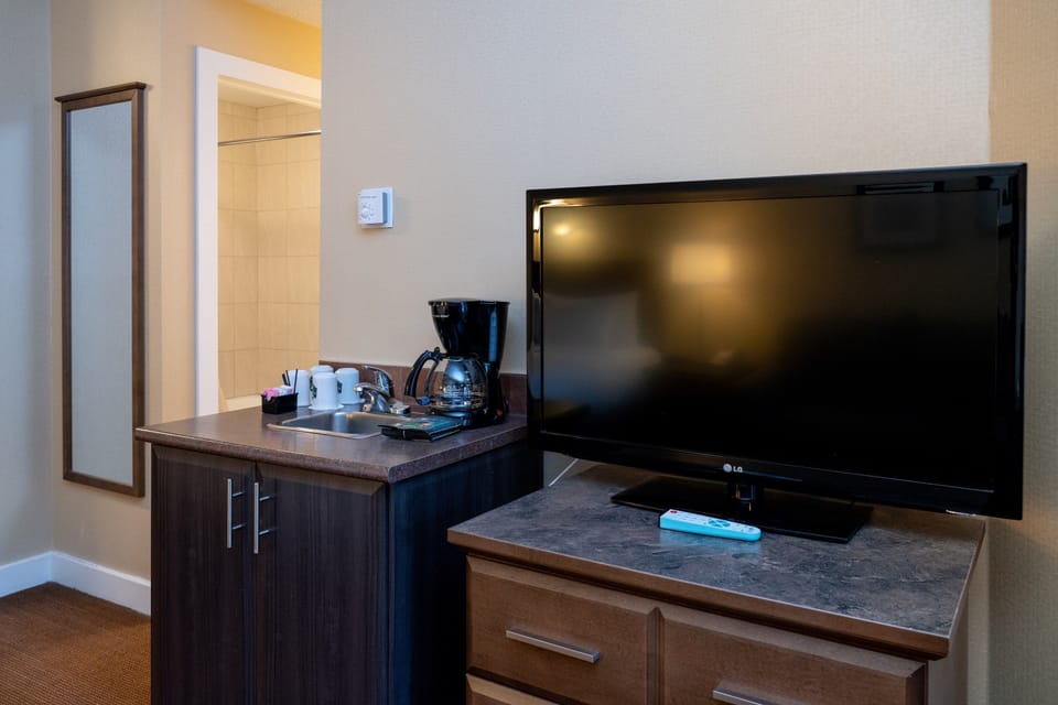 Watch a show on one of the TVs.