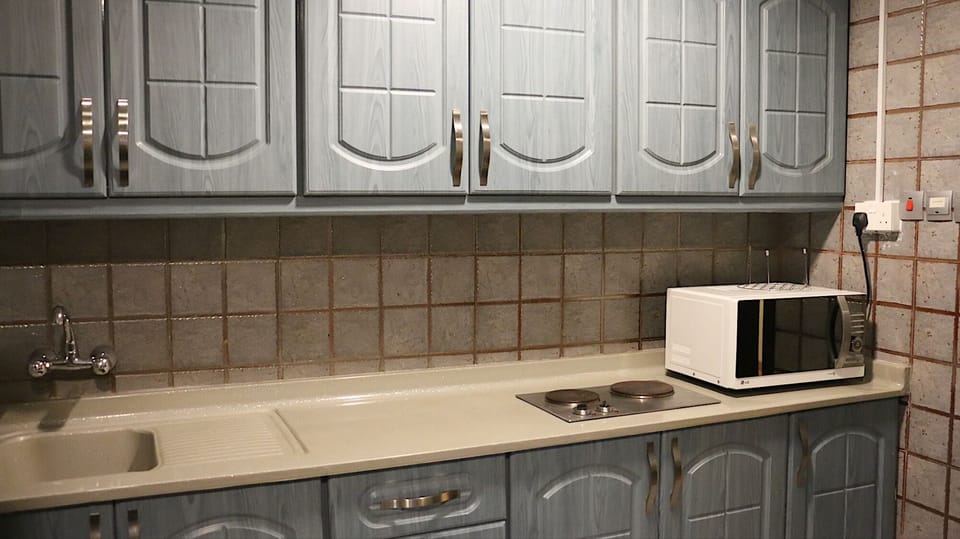 Coffee/tea maker, microwave (on request), cleaning supplies