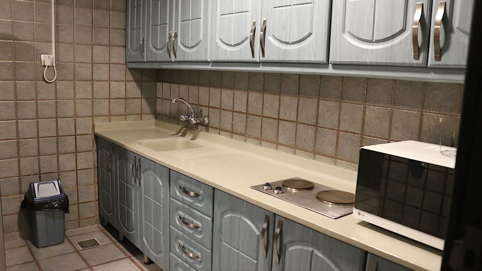Coffee/tea maker, microwave (on request), cleaning supplies
