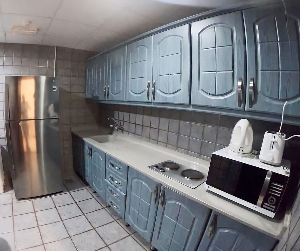 Coffee/tea maker, microwave (on request), cleaning supplies