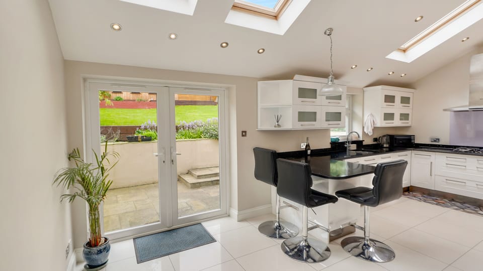 garden access door through kitchen..
