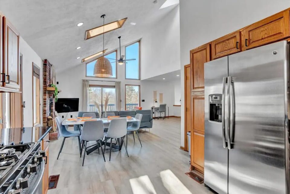 Fully equipped kitchen with stainless steel appliances.