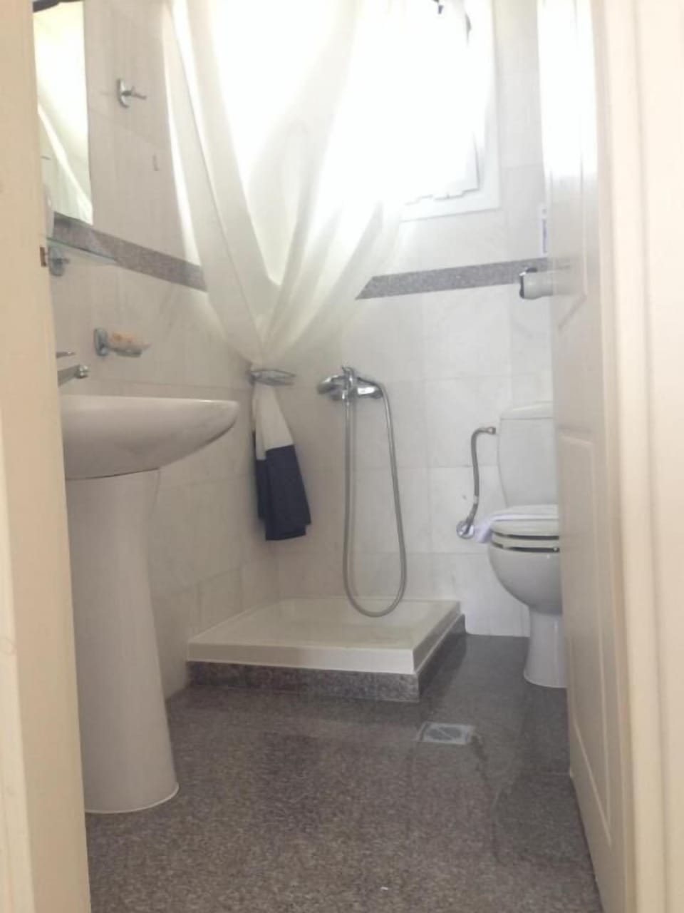 Shower, free toiletries, towels, toilet paper
