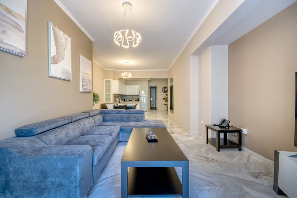 Bliss Apartment (2 bedrooms) | Living area | 27-inch flat-screen TV with satellite channels, TV