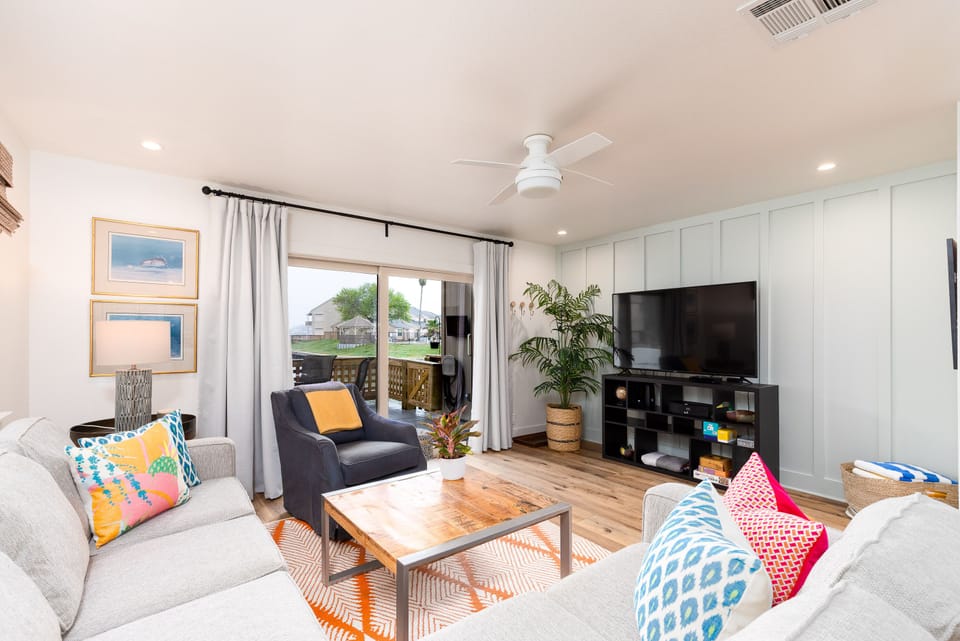 Sun drenched and pristine.  End unit means extra windows, light and bright.