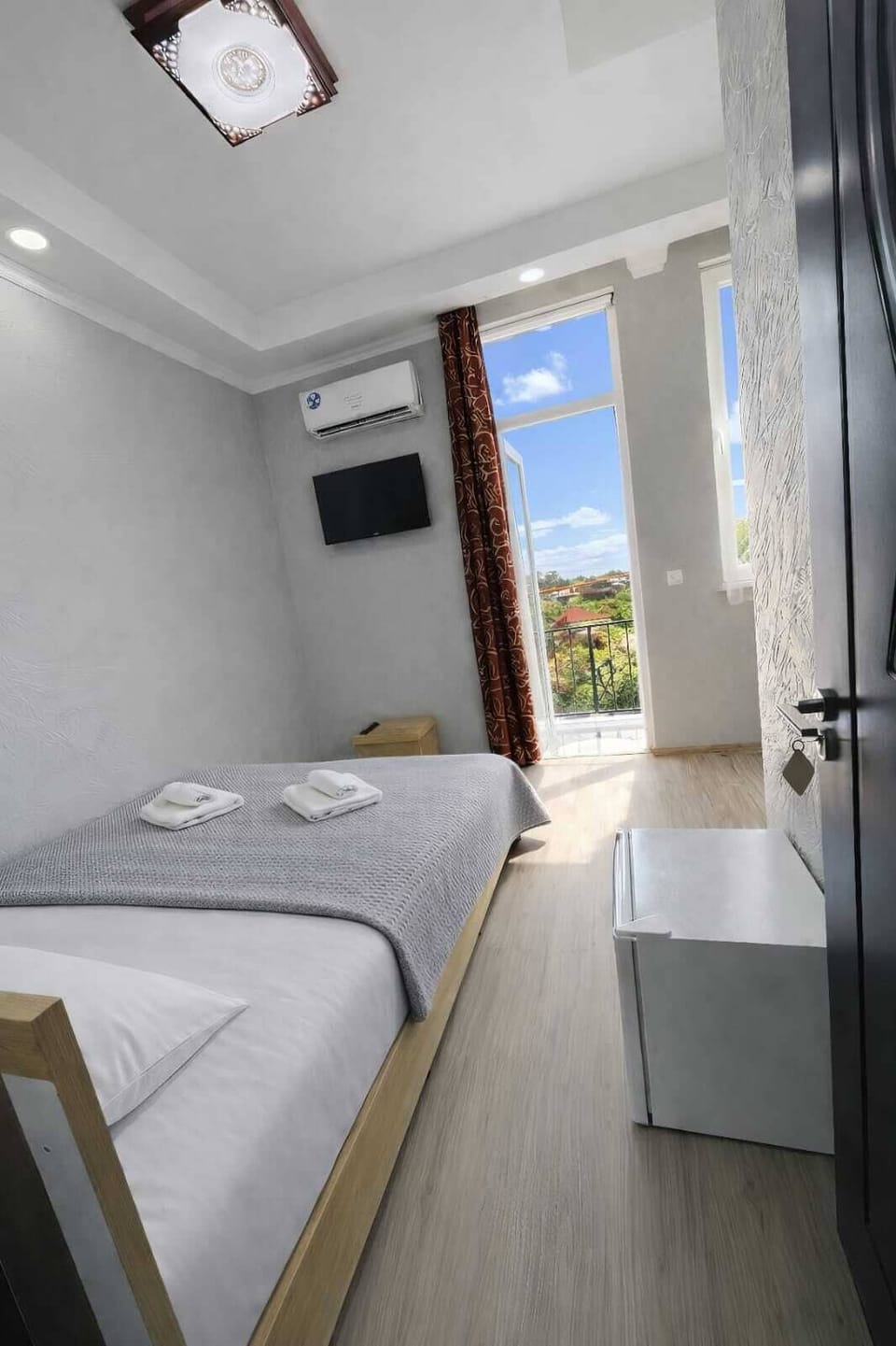 Premium bedding, blackout drapes, iron/ironing board, free WiFi