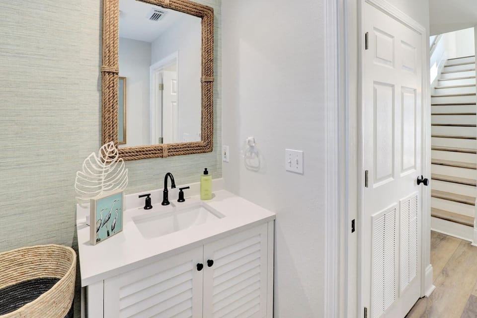 Your powder room keeps the main floor self-contained — guests have their own space.