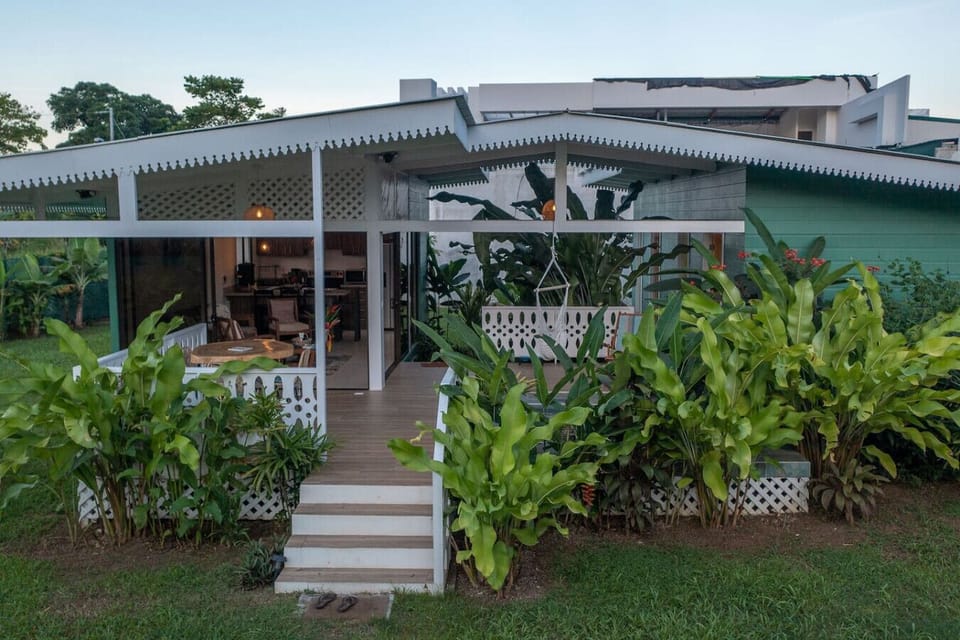 Property entrance surrounded by tropical garden in Cahuita