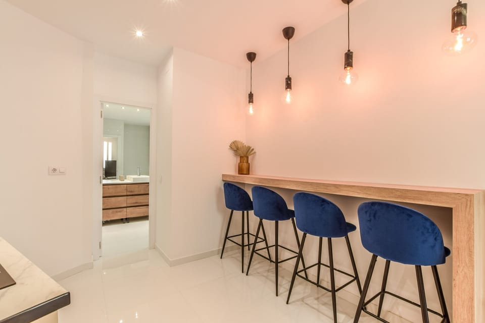 View of the dining area with high table and stools