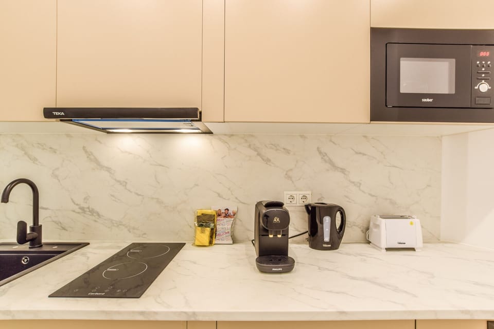 Main view of the kitchen with appliances