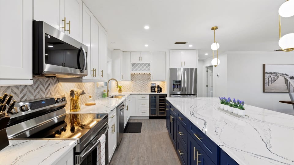 Kitchen equipped with your cooking essentials like a stove, top oven, microwave, and more.