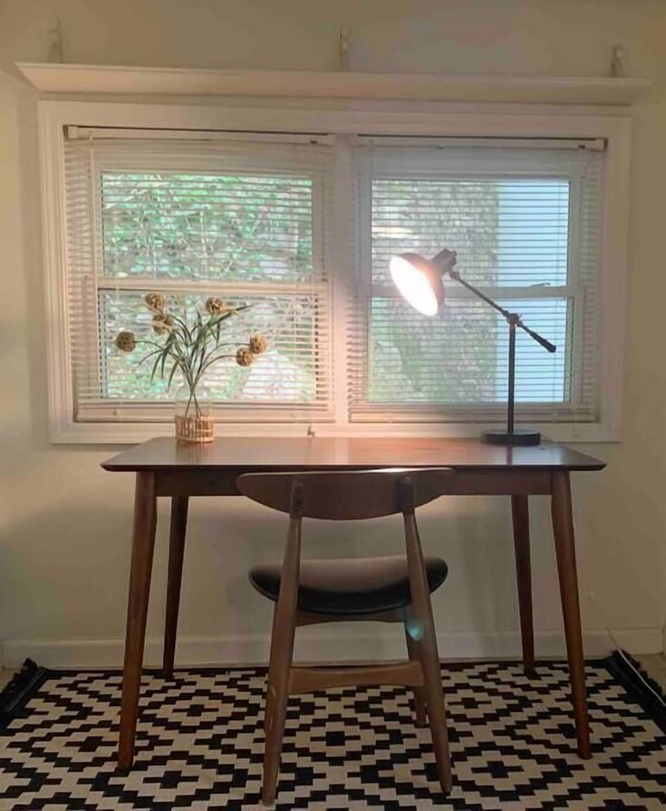 Spacious work area with nature views, perfect for deep thinking or remote work.