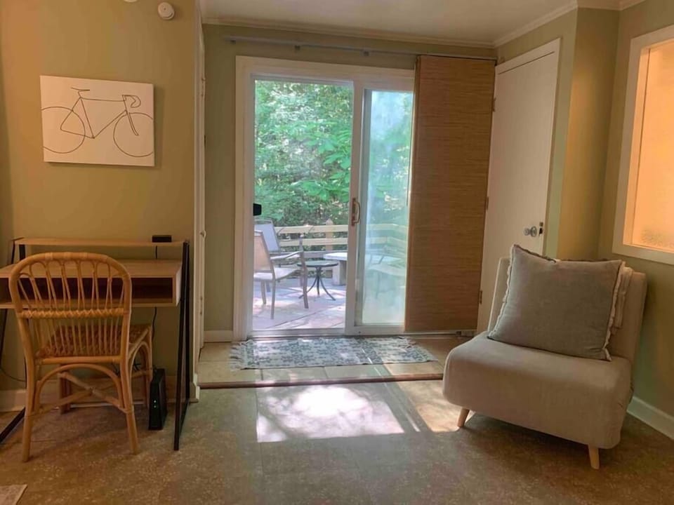 Relax in this sun drenched nook to read a book or look out into the forest 