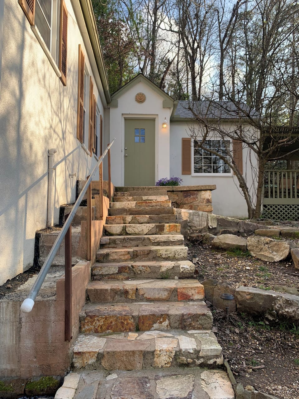 Stone staircase welcomes you to your peaceful cottage escape.