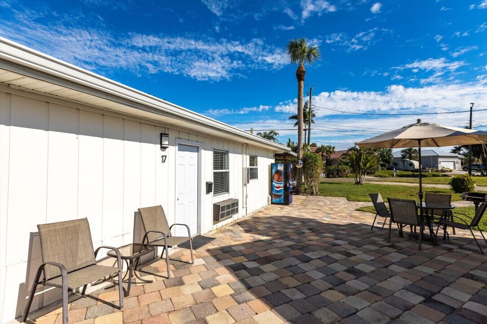 Paved patio area offering a relaxing evening atmosphere for guests.