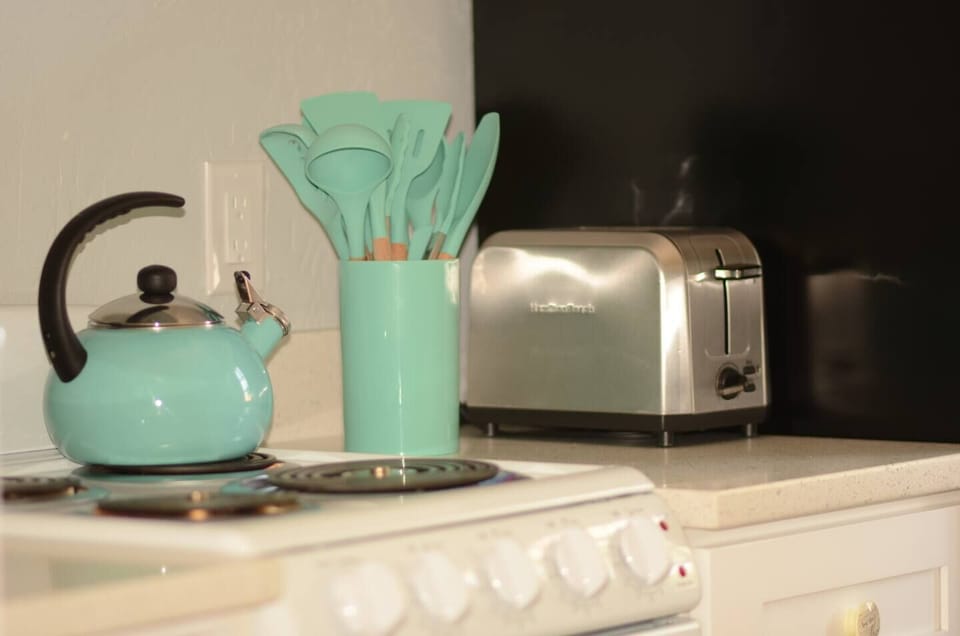 Tea kettle, cooking utensils , toaster