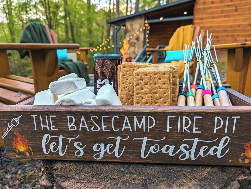 Be sure to bring all the fix's for your perfect fireside dessert. We store this fun s'mores box and metal marshmallow roasting sticks in the kitchen for your use