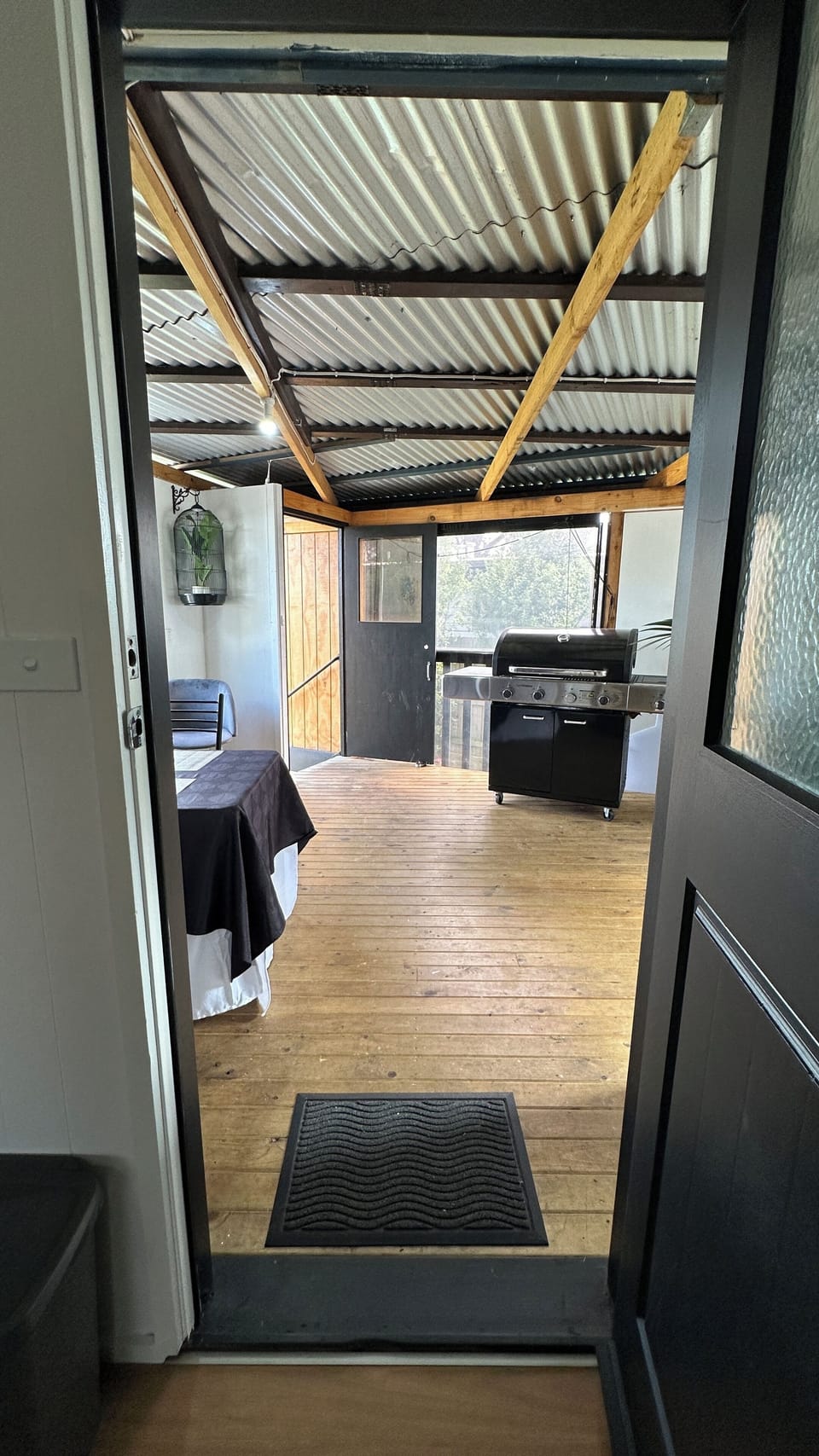 Covered deck and BBQ - doorway from kitchen