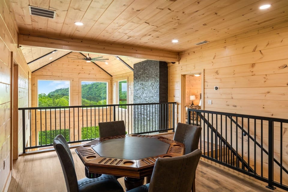 Upper level loft area with poker table