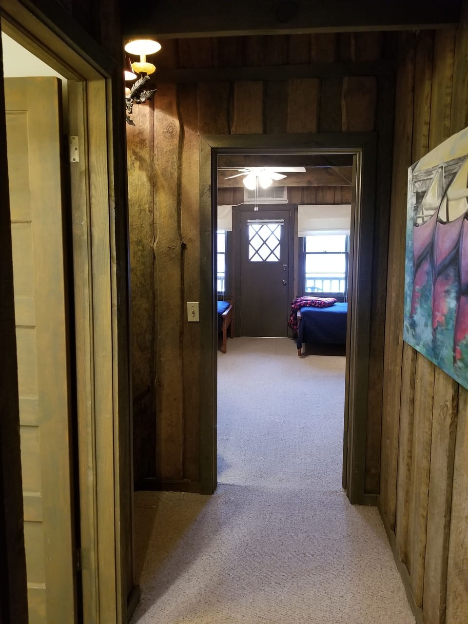 Upstairs hallway with full bath and two connecting bedrooms.  