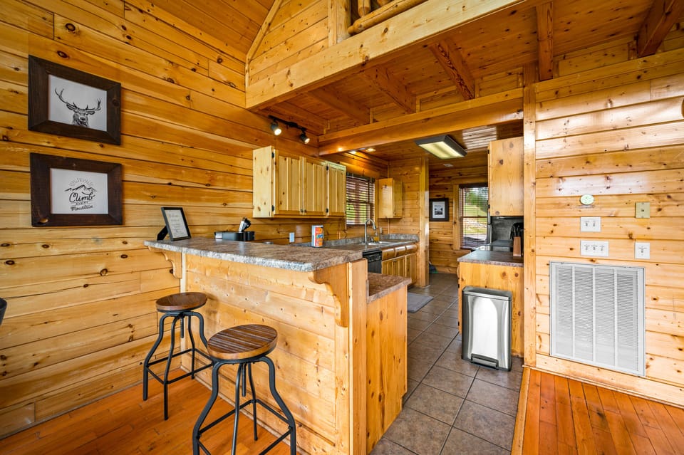 Utilize the kitchen bar for extra seating.