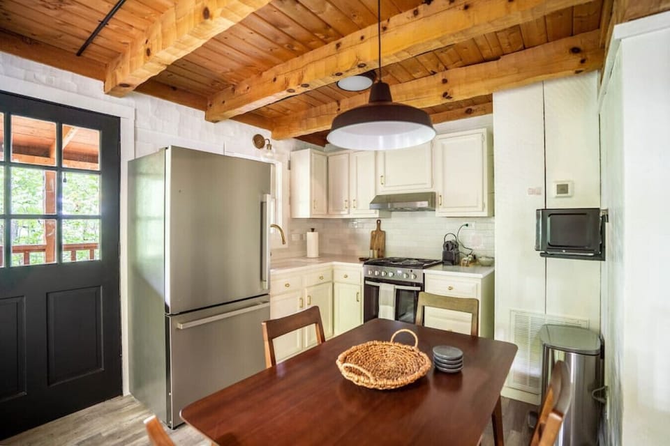 Newly renovated Kitchen with quartz countertops and custom tile