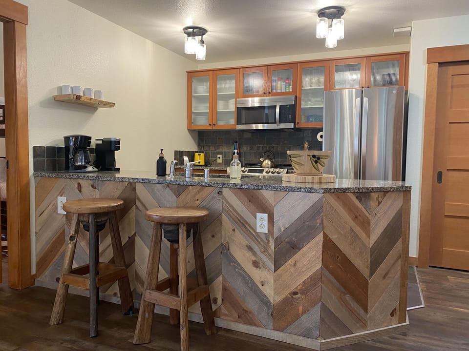 Updated fully stocked kitchen for enjoying time in the unit