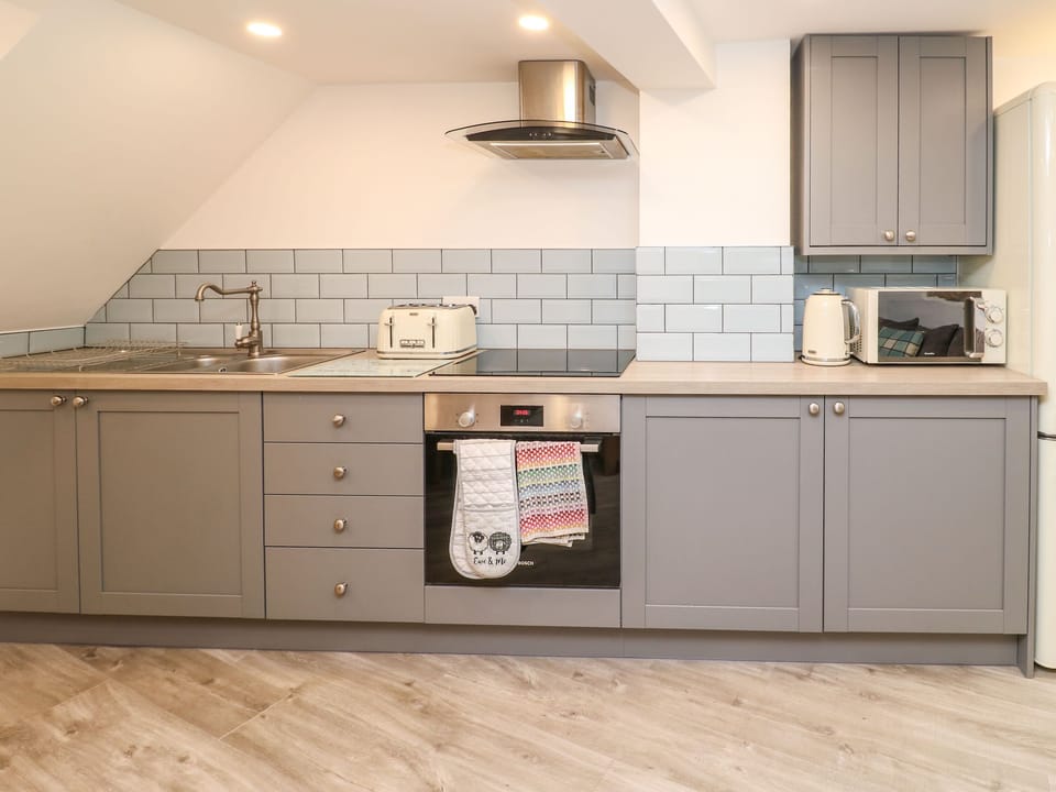 Fridge, electric kettle, toaster, cookware/dishes/utensils