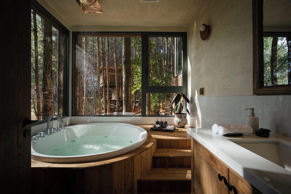 DELUXE WITH JACUZZI | Bathroom | Designer toiletries, hair dryer, bathrobes, slippers