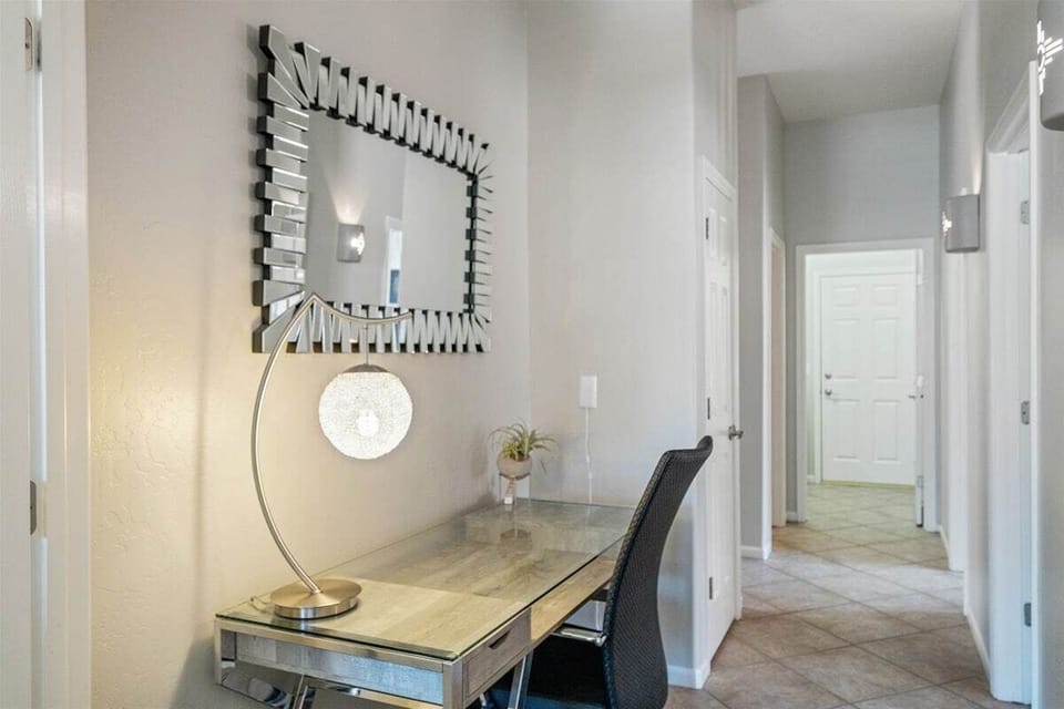 There is a desk located between the primary suite and the second bedroom for any work that needs to be done.