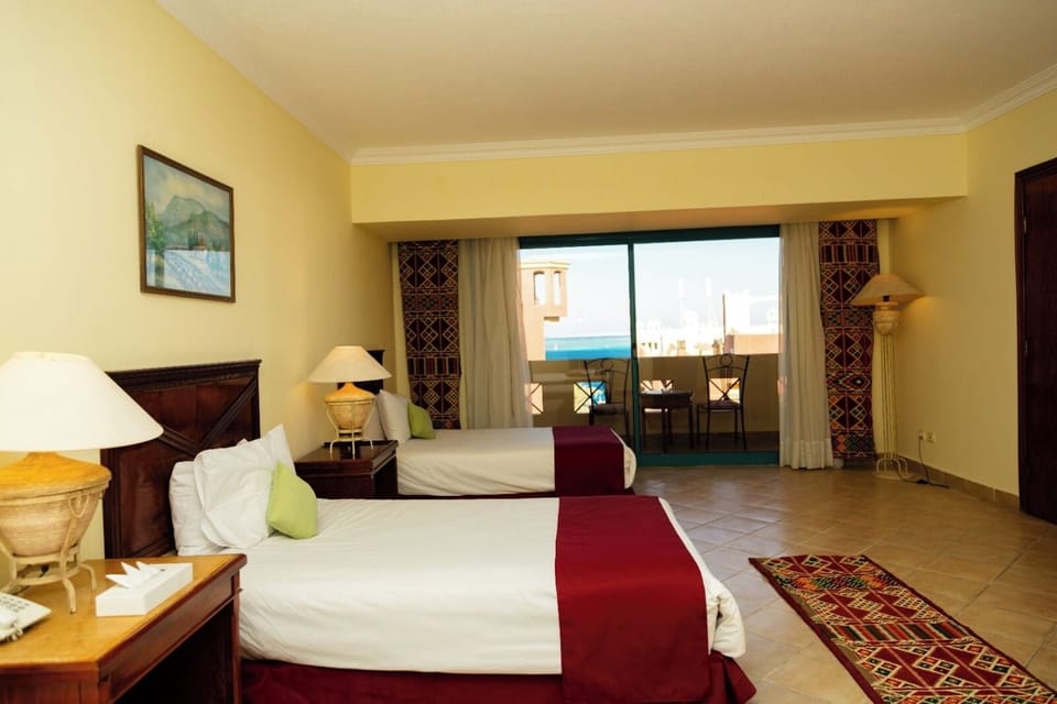 Premium bedding, minibar, blackout drapes, bed sheets