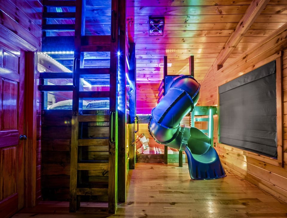 Bedtime turns into playtime with a slide, glowing lights, and cozy bunks that kids will love.
